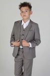 Device - Boy's Charles Grey Three Piece Suit - Elevate your young gentleman's style with this sophisticated grey three-piece suit from Device, seamlessly blending modern trends with timeless elegance.